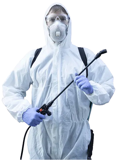 A professional pest control technician in Dubai wearing protective gear and holding a sprayer for safe, effective pest control.
